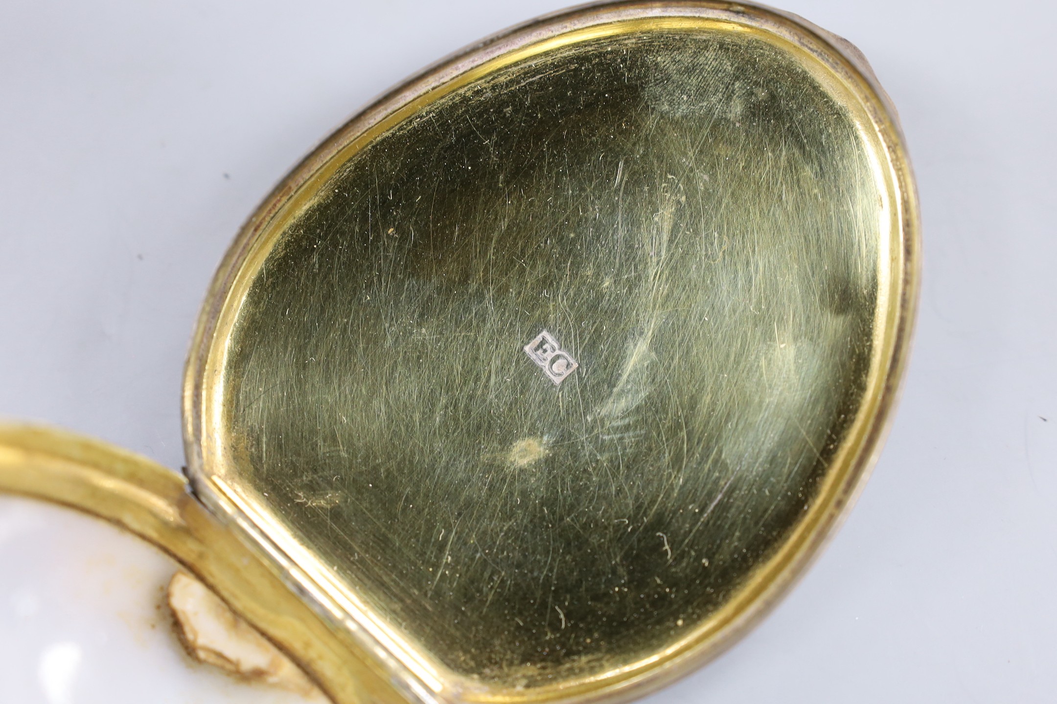 A late 18th/early 19th century white metal mounted cowrie shell snuff box, maker's mark only EC, 71mm.